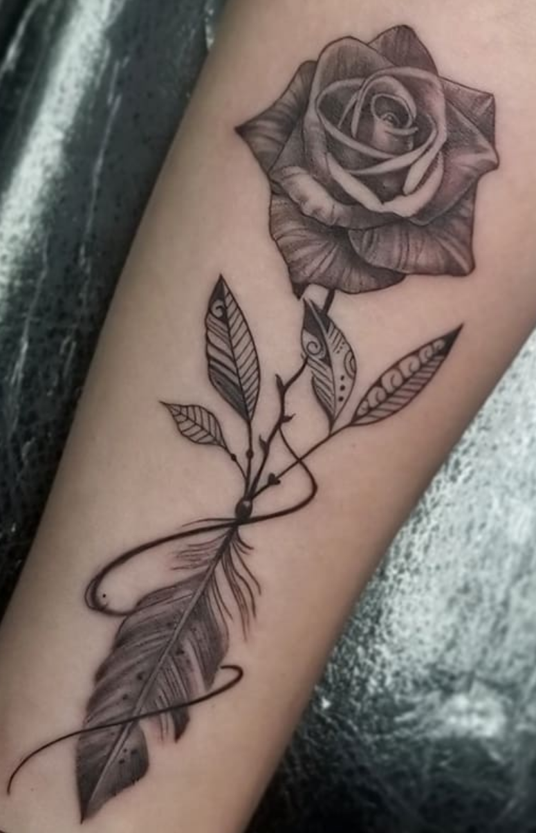 Detailed fine line flower tattoo